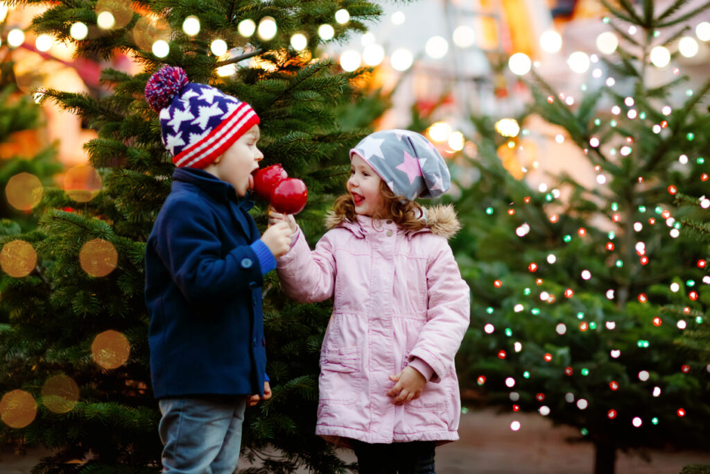 Foster children enjoying a day out at Christmas with their foster carers